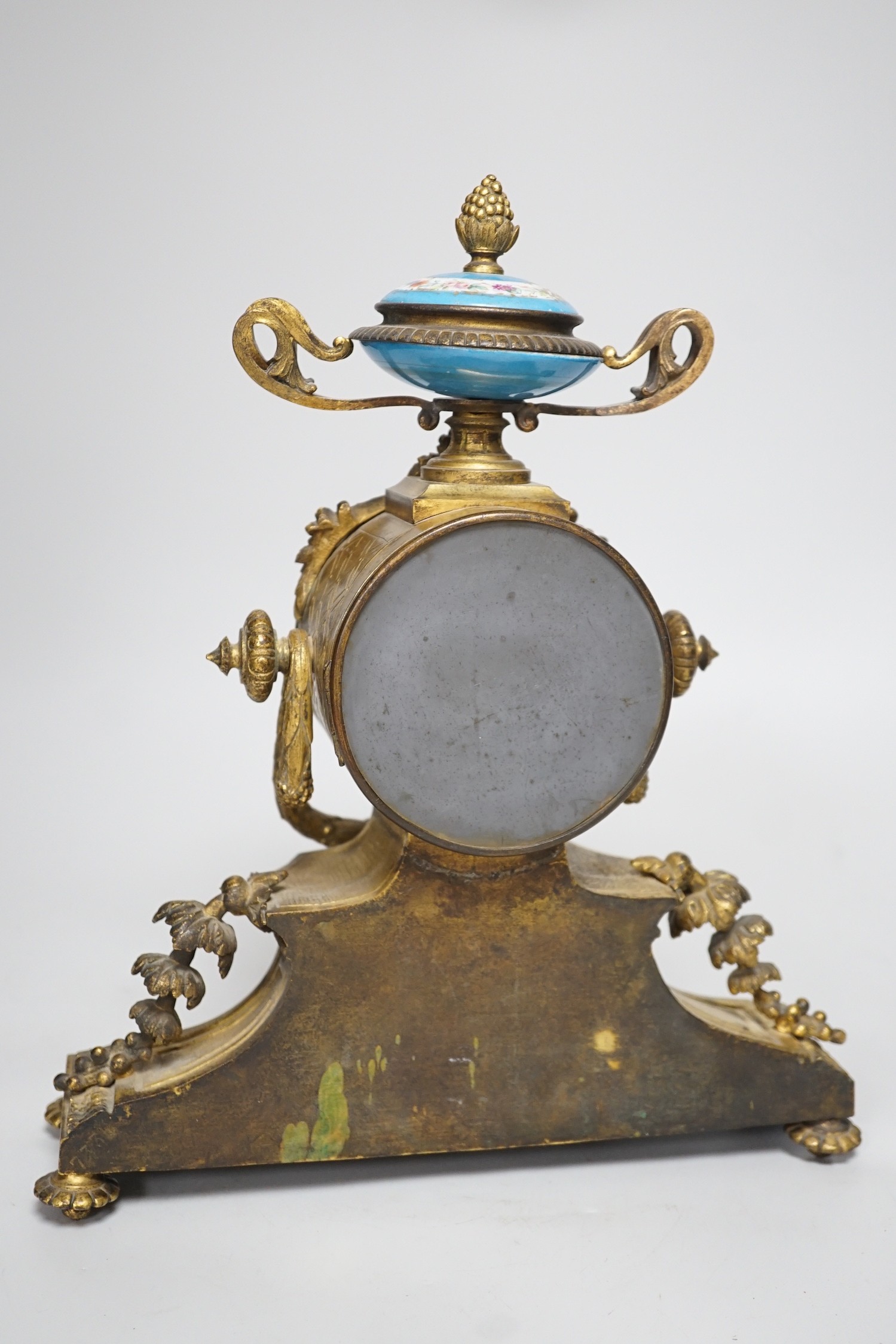 A 19th century French gilt-brass mantel clock with Sevres-style panels, 33cm